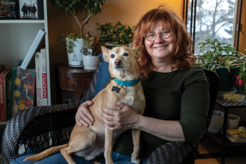 Meigan Cameron, an NDSU Extension master gardener, still finds a way to get dirt under her fingernails in winter, by turning her Bismarck home into a haven for plants and herbs. There is still room inside, of course, for her furry family member, Roomba.  Photos by NDAREC/Liza Kessel