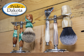 Badlands Shaving Co. sells shaving sets that include a matching stand, razor and brush.