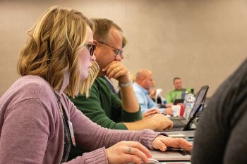 Brittnee Wilson, who works in communications at Northern Plains Electric Cooperative in Cando, attends a Co-op Web Builder training workshop in October 2019 for regional co-op communicators from North Dakota, South Dakota, Minnesota, Montana and Wyoming. The training was conducted by Touchstone Energy Cooperatives’ Sean Walker and sponsored by the N.D. Association of Rural Electric Cooperatives. Photos by NDAREC/John Kary