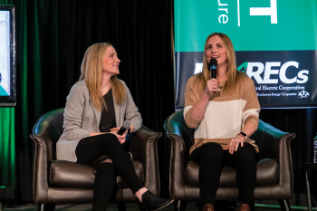 Monique Lamoureux-Morando, left, and Jocelyne Lamoureux-Davidson provided the keynote address at the 2022 annual meeting of the N.D. Association of Rural Electric Cooperatives. Photos by NDAREC/Liza Kessel