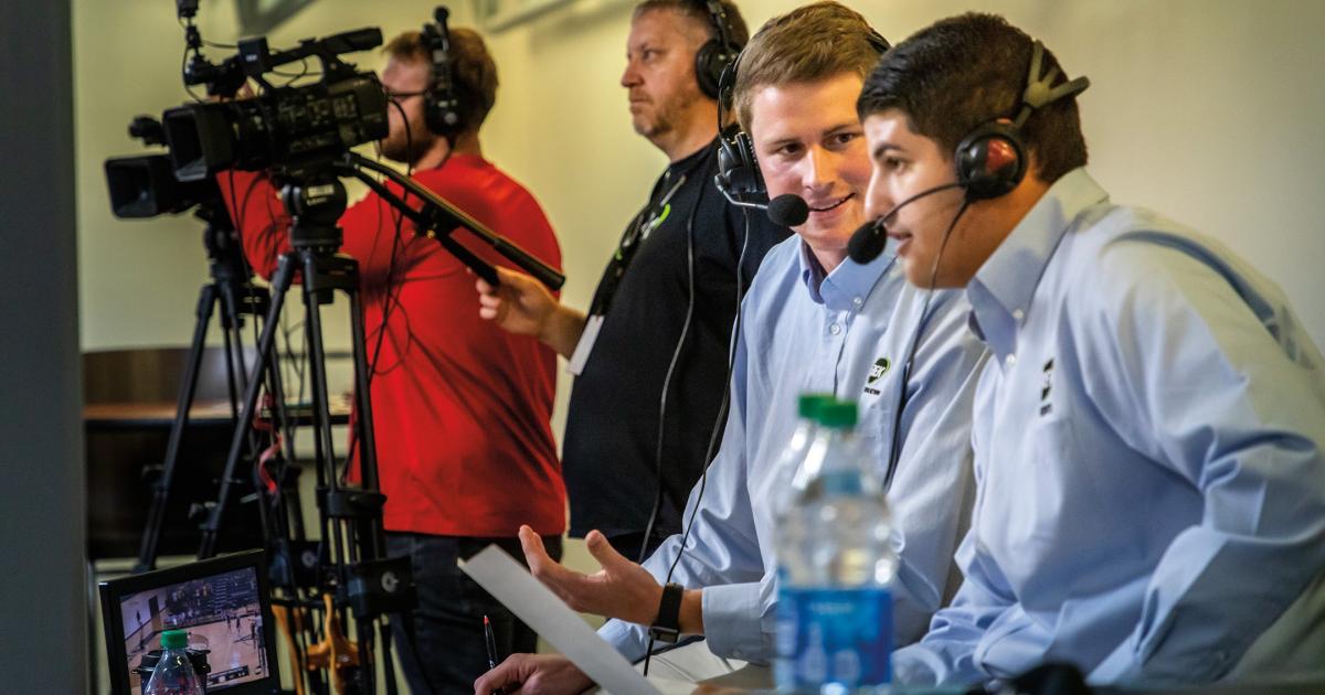 Zac Hoffner, left, and John Haugen operate on-site cameras during a recent BEK TV high school volleyball broadcast. They are joined by on-air talent, David Sugarman, right, and Noah Reed. A production crew back at the BEK TV studio directs the broadcast and airs it over the network.