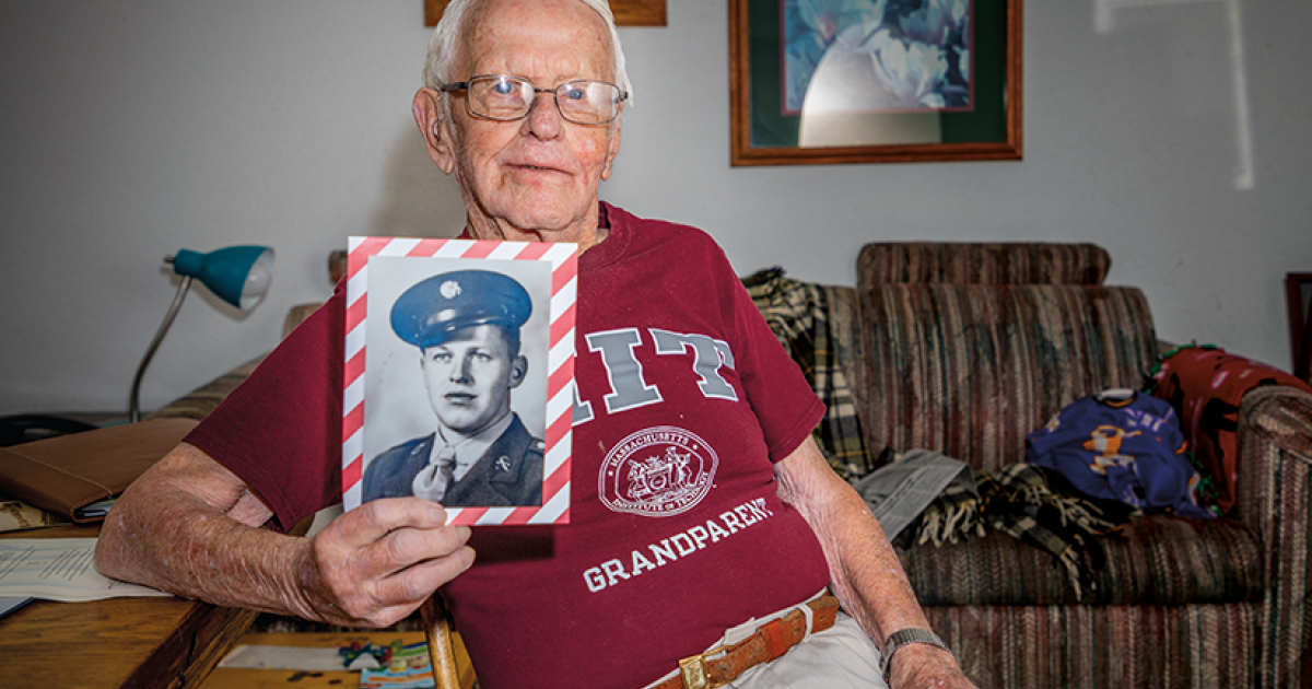 Robert “Bob” Hunter, Maddock’s oldest resident, holds his U.S. Army portrait, taken over 75 years ago during his World War II service. Photos by NDAREC/Liza Kessel