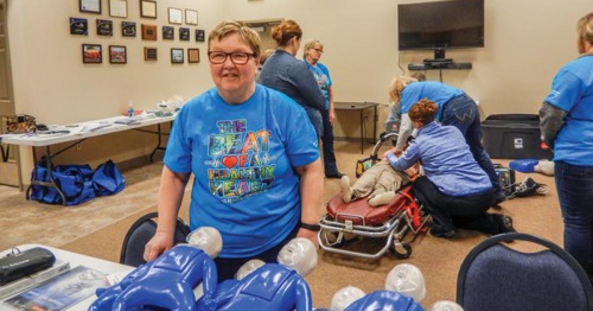 Kari Enget, left foreground, is a cardiac ready squad leader in Powers Lake, and is part of the CPR classes the community is conducting (Photos by Candi Helseth)