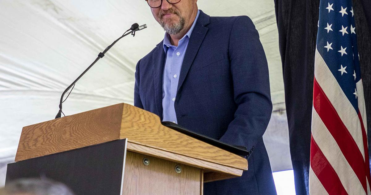 Eric Hardmeyer, manager of the Bank of North Dakota (BND), addresses a crowd during a public celebration to commemorate 100 years of BND, the nation’s only state-owned bank.  Photo by NDAREC/Liza Kessel