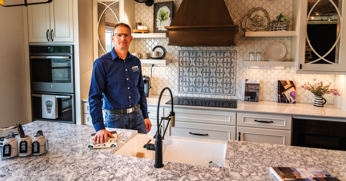 Dave Lebrun stands in a model kitchen at Souris River Designs, his building and remodeling business, in Minot. Photo By Tom Rafferty