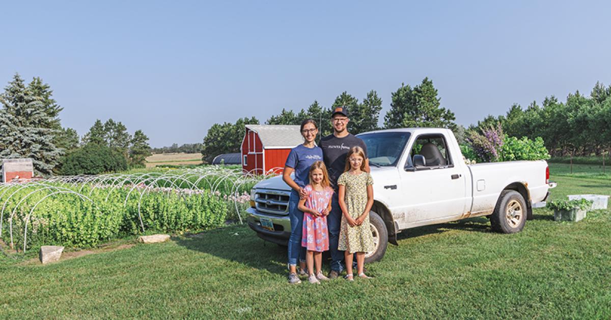 Nathan and Theresa Dessonville, with their daughters, Abby and Laura