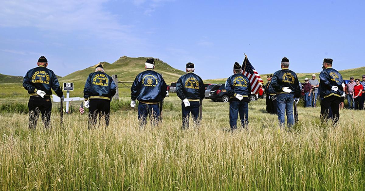 During a memorial dedication to a fallen soldier, the Schafer-Boye-Lange American Legion Post 69 from Flasher sounded a 21-gun salute and played taps.