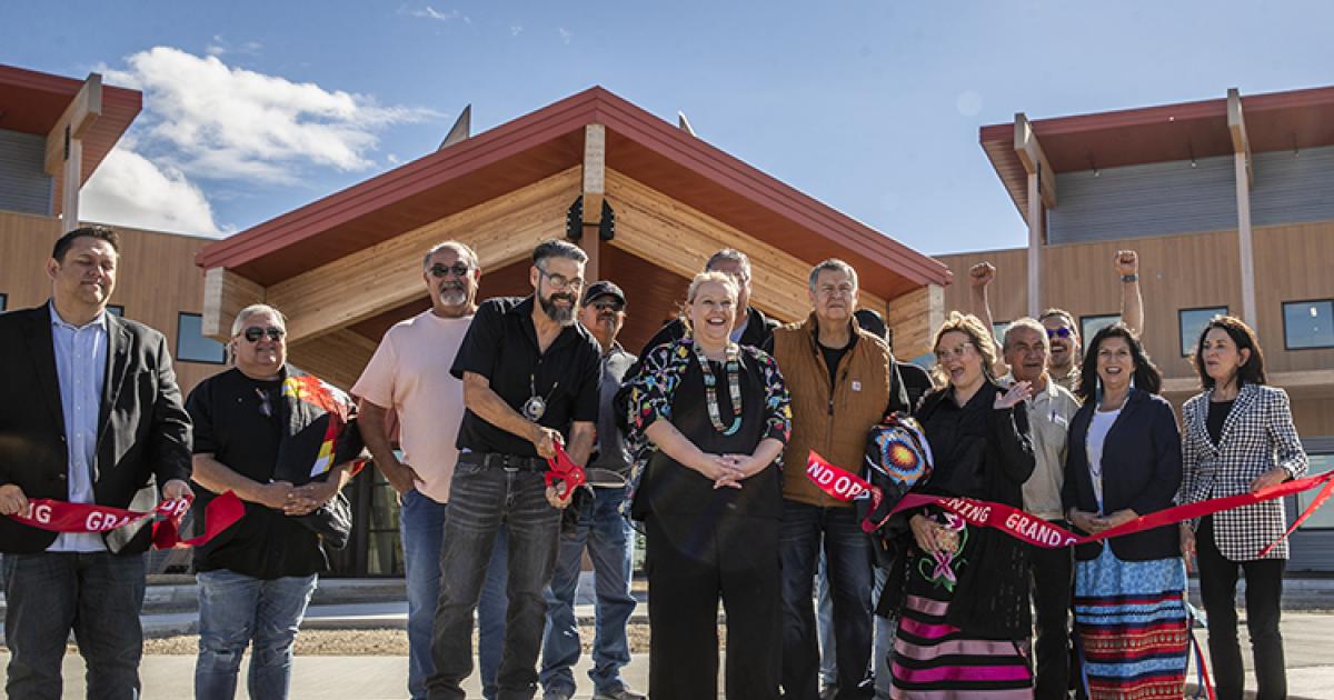 Turtle Mountain Band of Chippewa Tribal Chairman Jamie Azure cuts the ribbon to commemorate the Turtle Mountain Recovery Center grand opening Oct. 2.