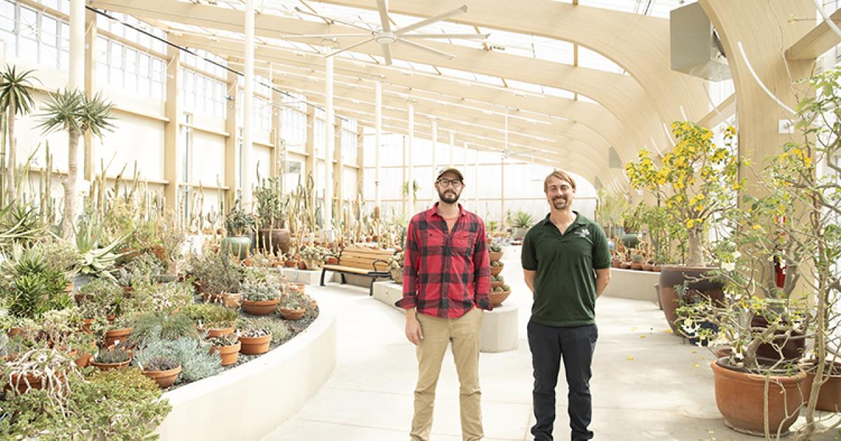 Conservatory Horticulturist Jonah Neufeld, left, and Curator of Living Collections Johannes Olwage, right