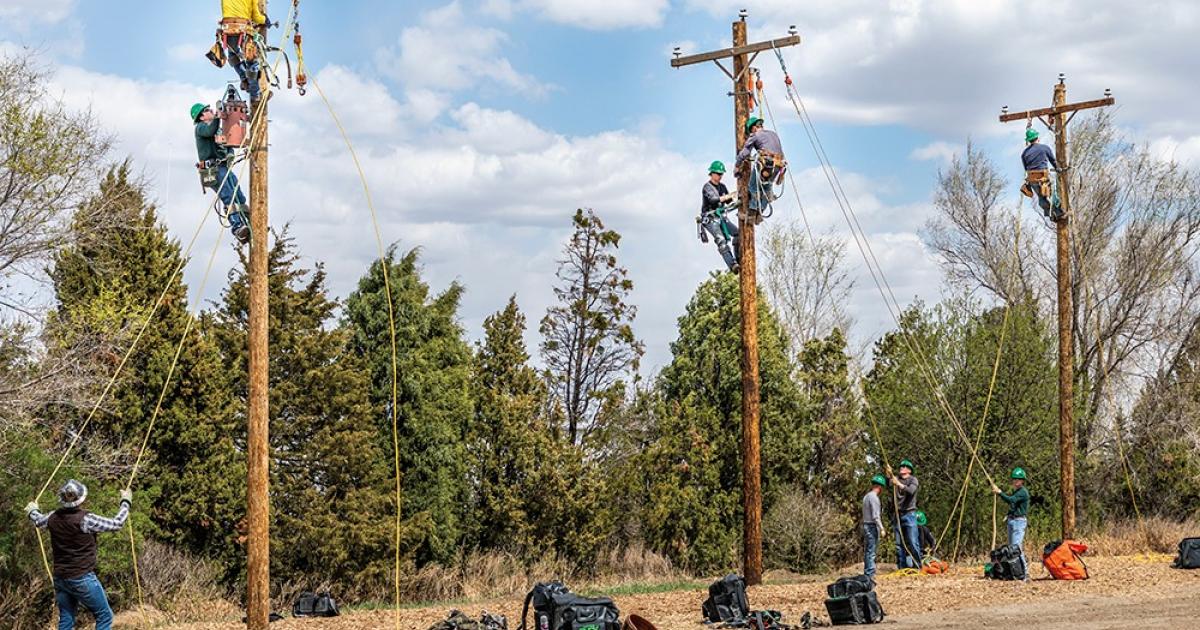 Bismarck State College (BSC) lineworker students provide demonstrations at a May 6 event celebrating a 50-year partnership between BSC and the North Dakota Association of Rural Electric Cooperatives.