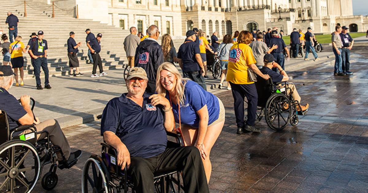 Cally Peterson traveling with veterans on an Honor Flight